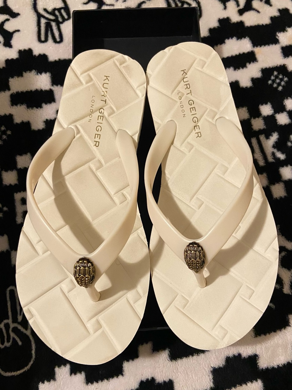 Kurt Geiger Cream Flip Flop Sandals with Gold Embellishment